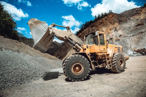 Industrial wheel loader working on construction site